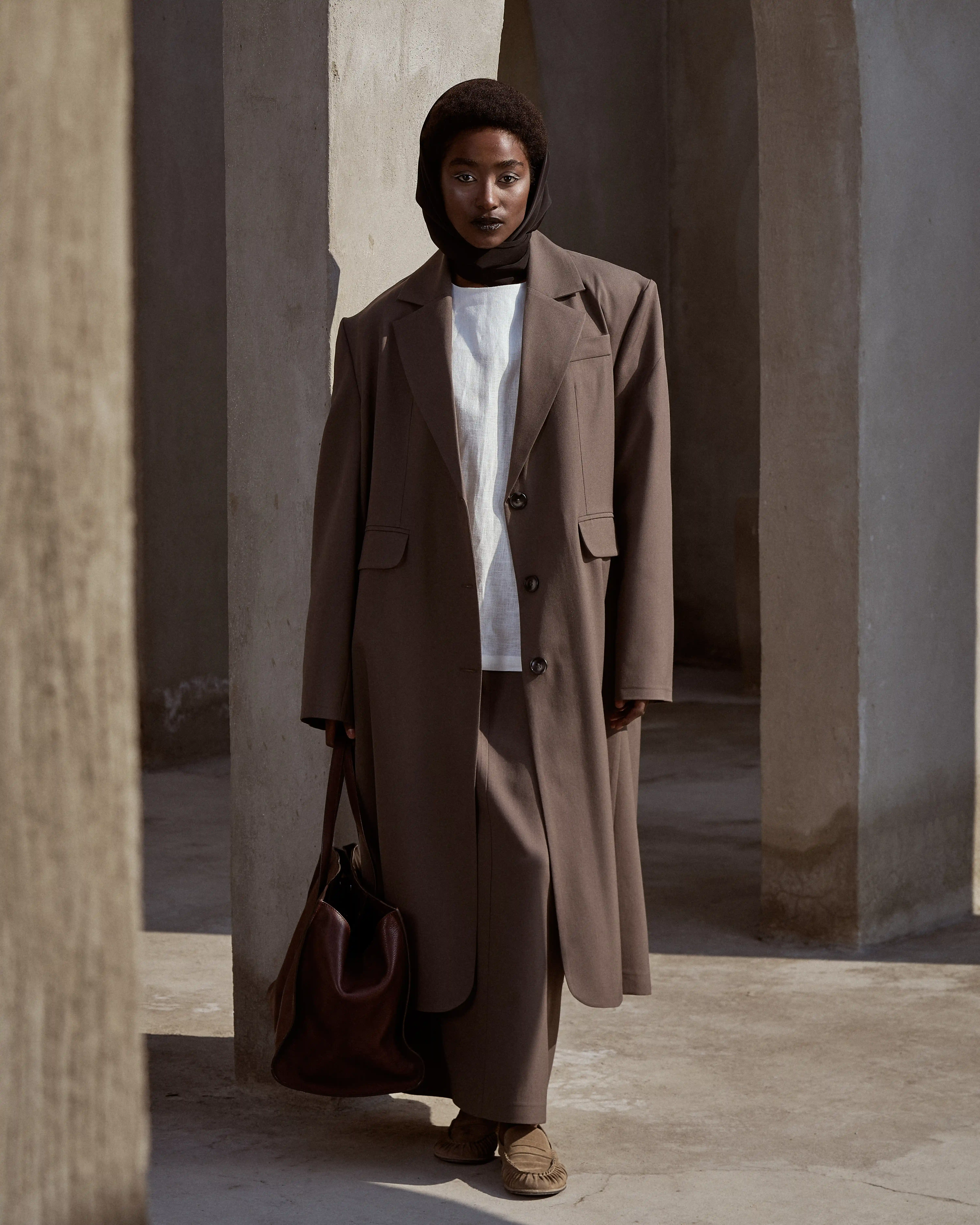 مانتو فاستوني با برش روي آستين